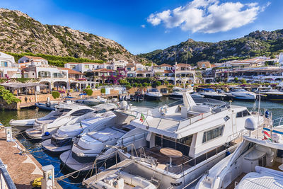 Boats moored at harbor