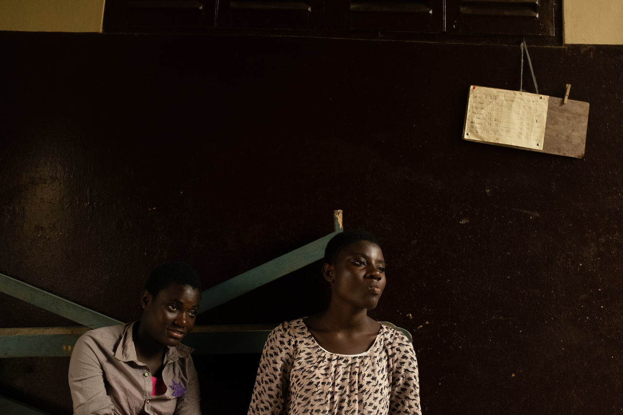 PORTRAIT OF SMILING YOUNG COUPLE