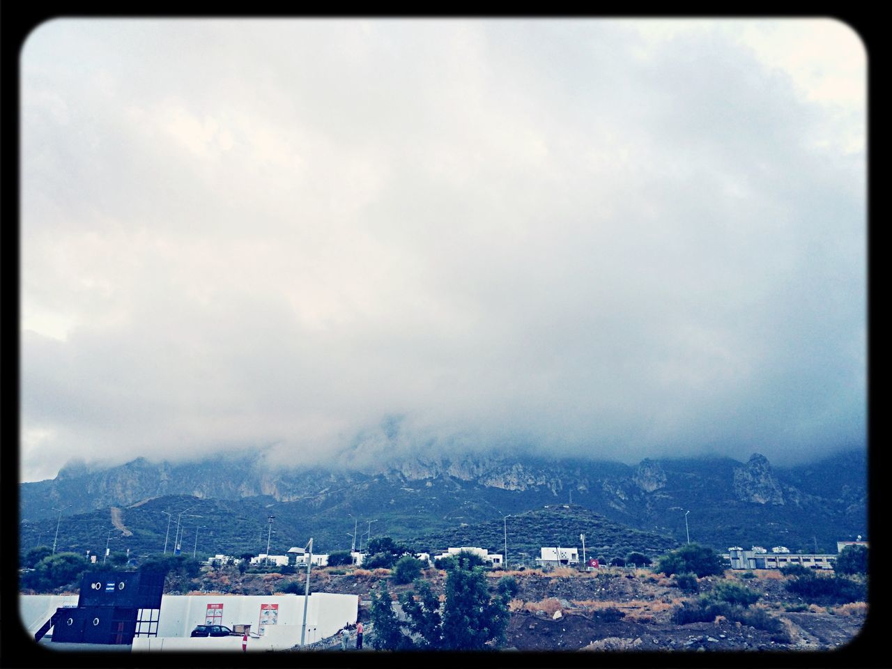 transfer print, auto post production filter, sky, cloud - sky, cloudy, cloud, scenics, beauty in nature, nature, tree, low angle view, weather, tranquility, tranquil scene, panoramic, day, outdoors, no people, building exterior, built structure