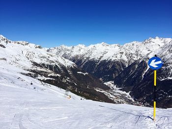 Snowcapped mountains against clear sky