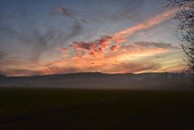 Scenic view of landscape against sky during sunset