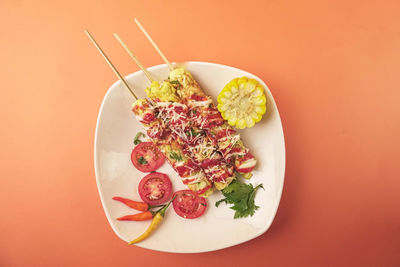 Directly above shot of meal served on table