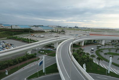 High angle view of highway against cloudy sky