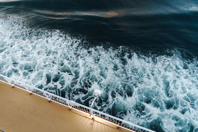 High angle view of water splashing in sea