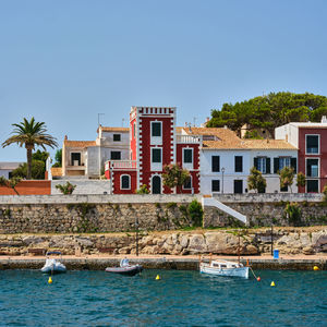 Architecture of houses on the coast of the port of mahon mao in menorca, spain