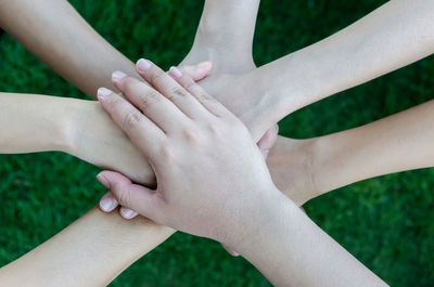 Cropped image of man holding hands