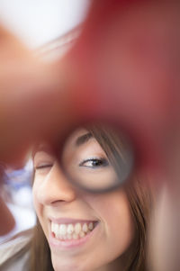 Close-up portrait of smiling woman