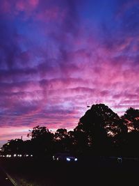 Scenic view of landscape against cloudy sky