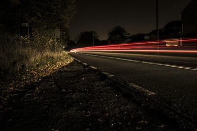 Light trails on road at night