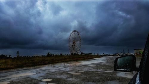 View of road against cloudy sky