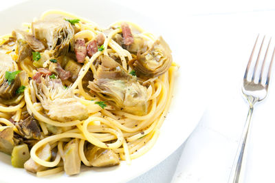 Close-up of noodles served in plate