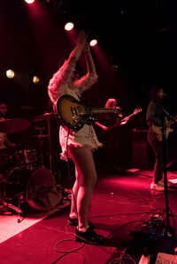 Full length of man standing on stage