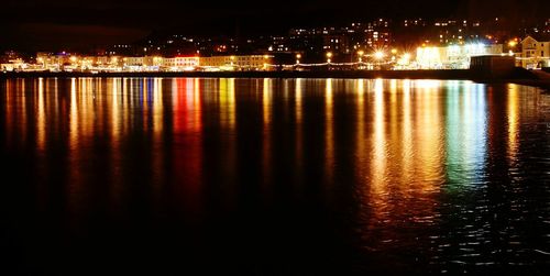Illuminated cityscape at night