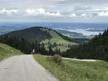 Scenic view of landscape/ chiemsee against sky