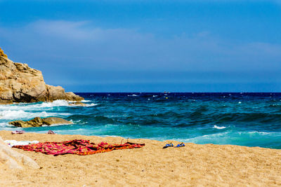 Scenic view of sea against blue sky