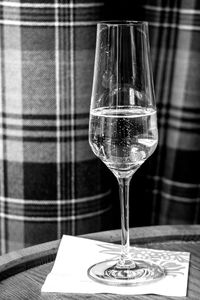 Close-up of wine glass on table