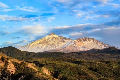 Panoramic view of volcanic landscape against sky