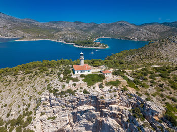 Scenic view of sea against blue sky
