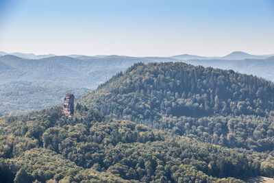 High angle view of trees and mountains against sky