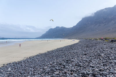 Scenic view of beach against sky