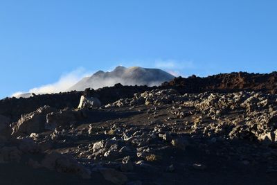 Panoramic view of arid landscape against clear sky