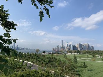 Panoramic view of city buildings against sky