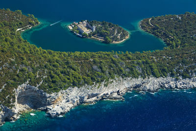 Aerial salt lakes and benedictine monastery on mljet island, adriatic sea, croatia