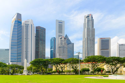 Modern buildings in city against sky