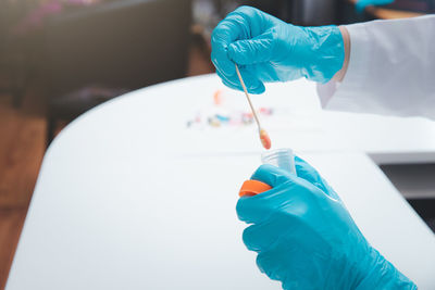 Close-up of person holding medicine