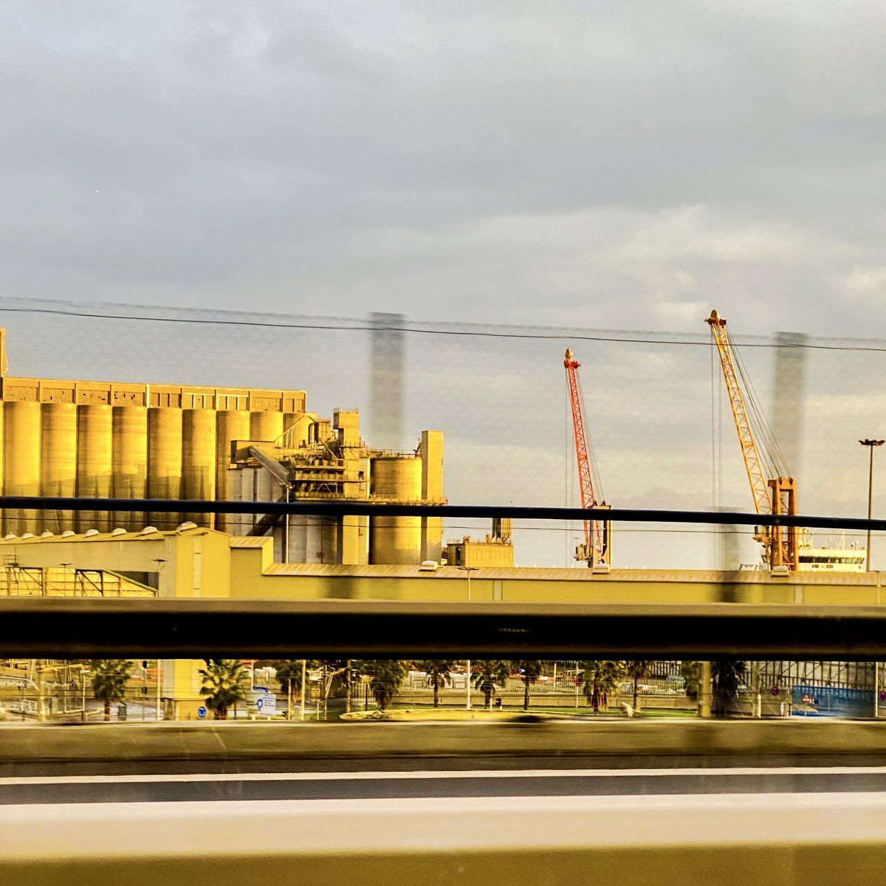 VIEW OF BRIDGE OVER RIVER AGAINST SKY