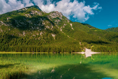 Panoramic view of lake dobbiaco  in the dolomites, italy.