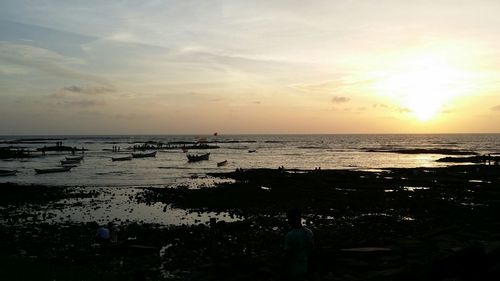 Scenic view of sea at sunset