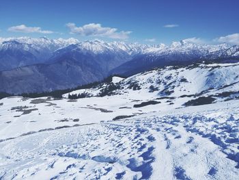 Snow covered mountains against sky