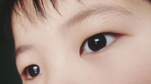 Close-up of child eyes looking away