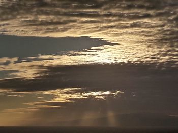 Scenic view of sea against sky at sunset