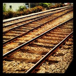 Railroad tracks on railroad station platform