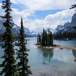 Scenic view of snowcapped mountains and lake against sky