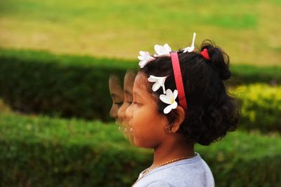 Multiple image of girl wearing flower on hair