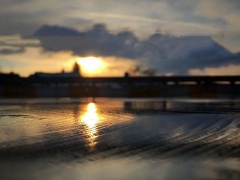 Close-up of silhouette water against sky during sunset