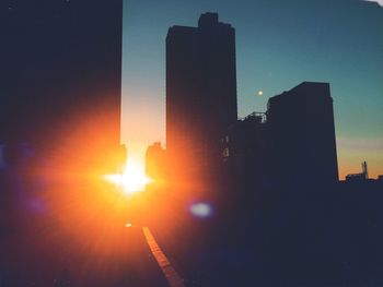 Silhouette of buildings at sunset