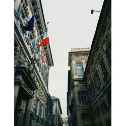 Low angle view of buildings against clear sky