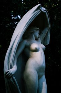 Close-up of angel statue in garden