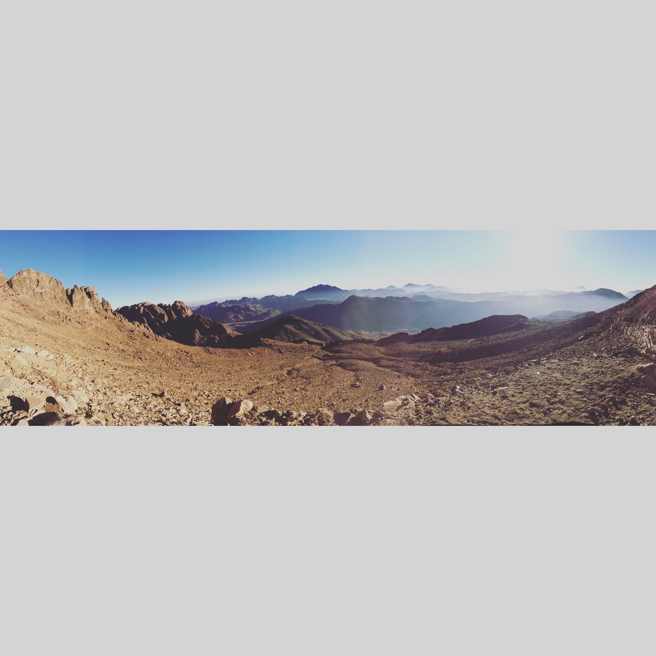 SCENIC VIEW OF MOUNTAINS AGAINST CLEAR SKY