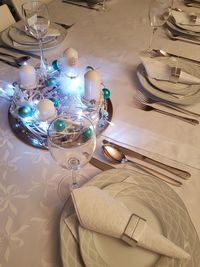 High angle view of wine glasses on table