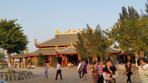 People in front of temple