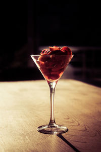 Close-up of wineglass on table