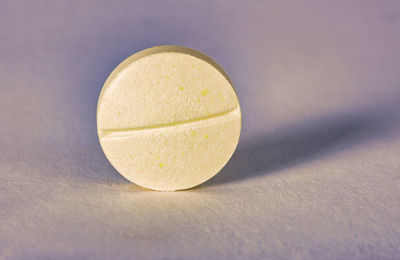 Close-up of yellow ball on table