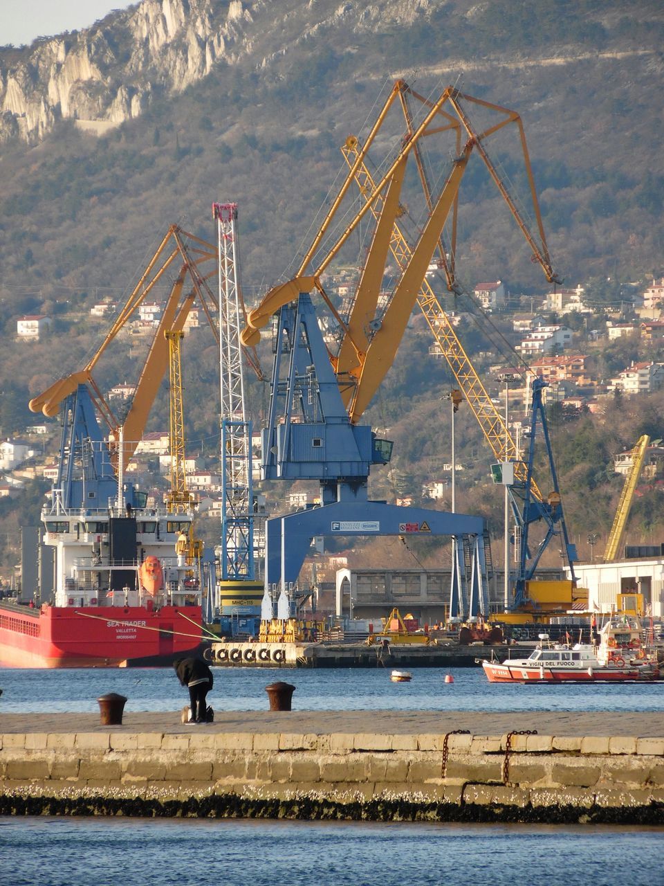 transportation, nautical vessel, mode of transport, water, boat, moored, harbor, mast, waterfront, commercial dock, crane - construction machinery, river, industry, sea, freight transportation, sailboat, outdoors, nature, sky, development