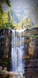 View of waterfall in forest