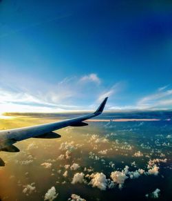 Airplane flying over blue sky